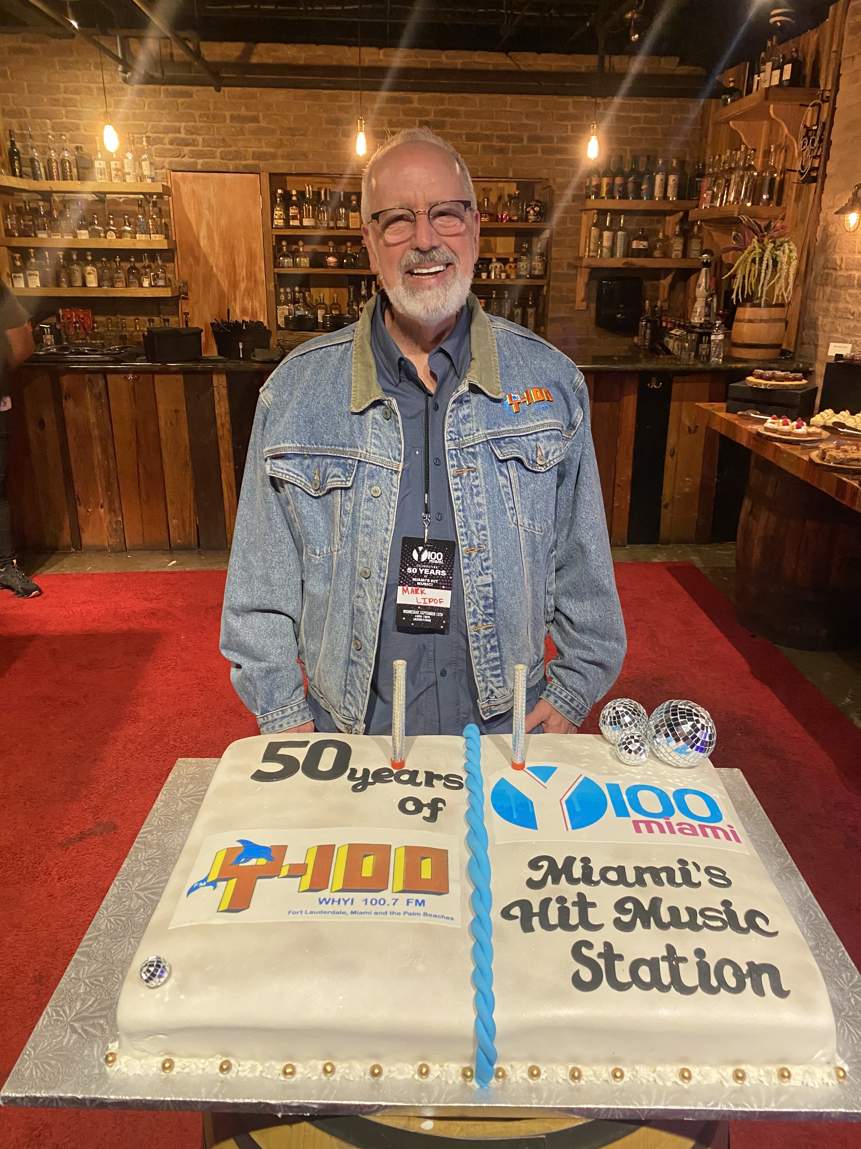Mark Lipof with Y-100 cake